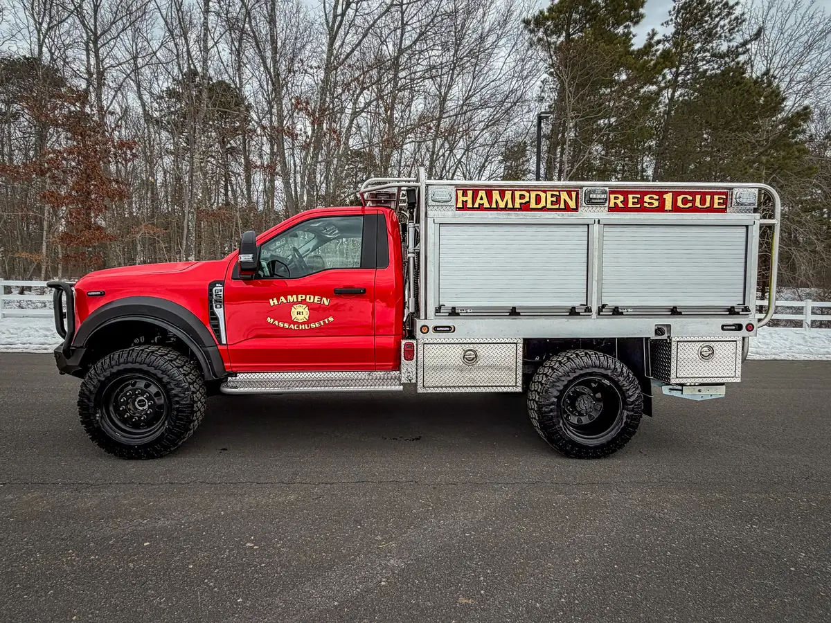 Driver-side profile with HAMPDEN RESCUE lettering on upper body.